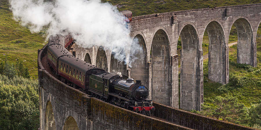 Stream train on viaduct